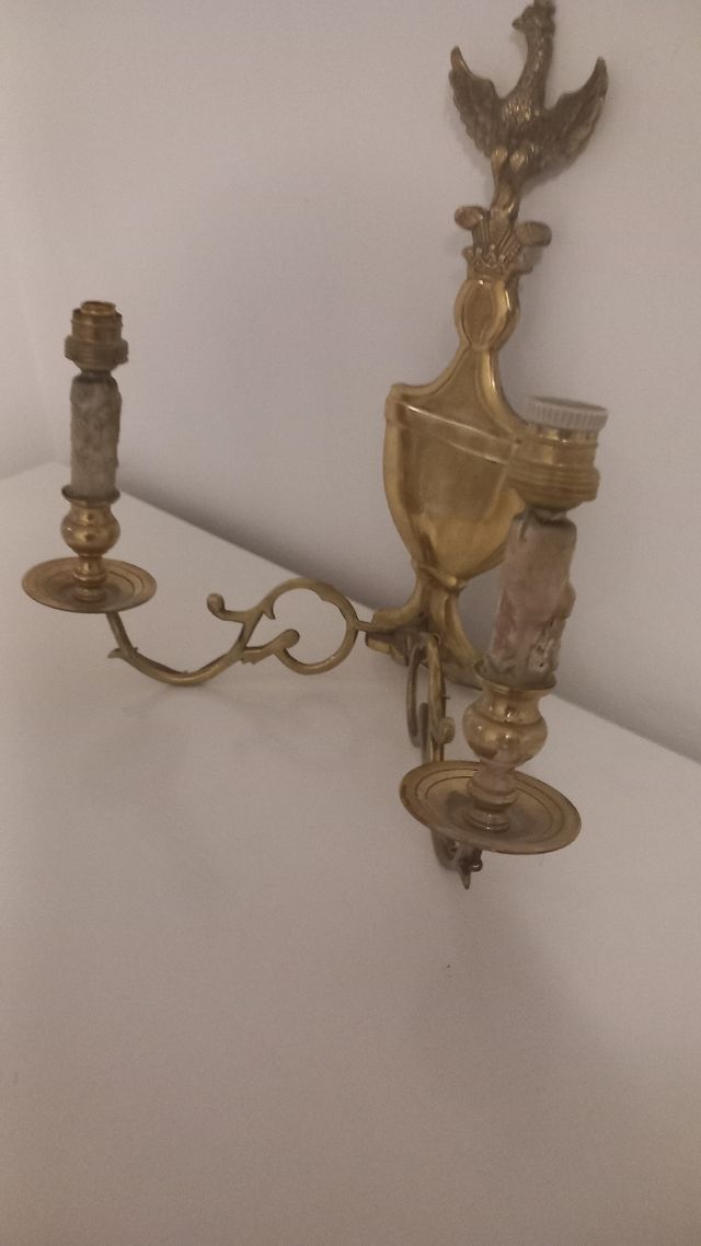 Aplique de pared antiguo con ave