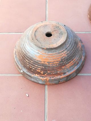 Macetas de terracota y plástico