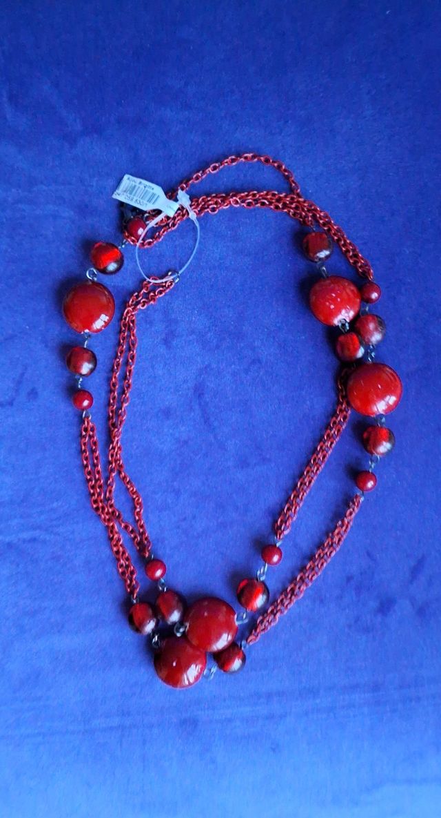 Collar y pulsera color vino