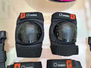Casco rosa y protectores Oxelo