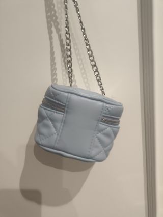 Bolso monedero Stradivarius azul