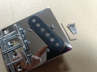 Puente Telecaster cromado zurdo con pastilla