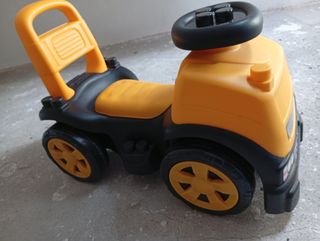 Cochecito infantil amarillo y negro