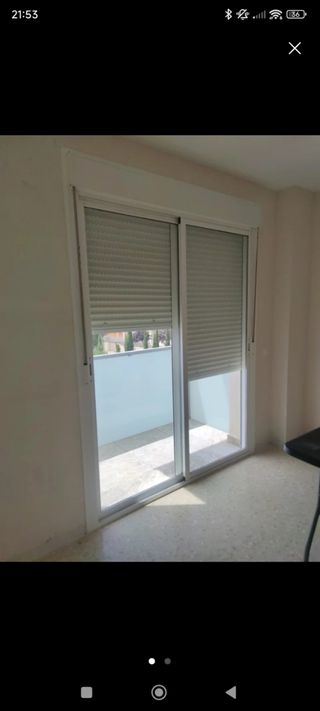 Ventana corredera con persiana