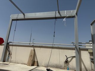 Pérgola motorizada con toldos corredizos