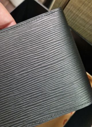 Cartera de caballero negra