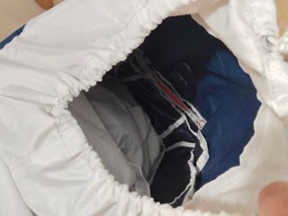 Mochila Quechua 20L azul y roja