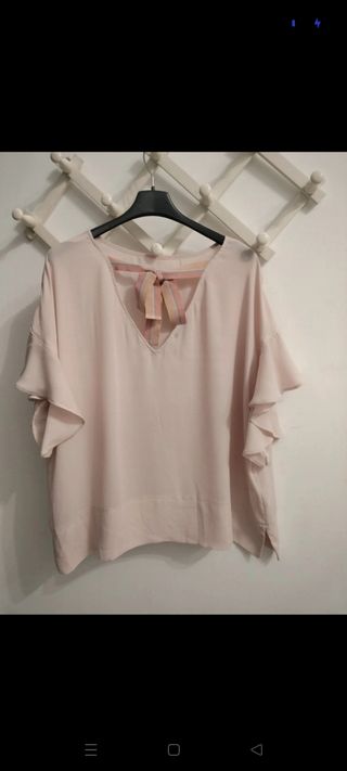 Blusa Oltre rosa con fiocco