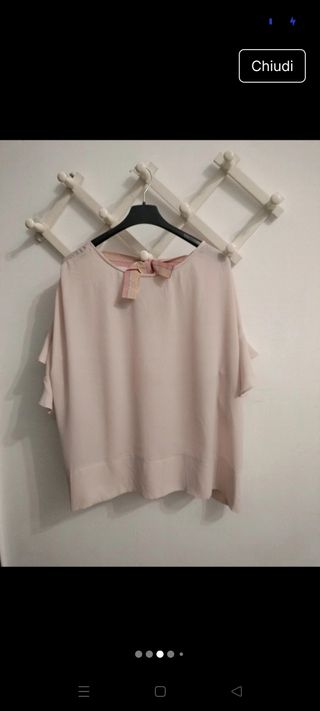 Blusa Oltre rosa con fiocco