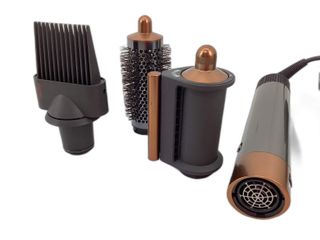 secador pelo dyson hs05