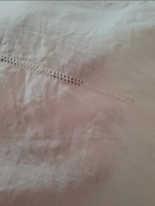 Completo letto ricamato a mano puro lino.