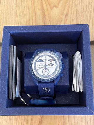 Swatch omega Moonshine Gold Earthphase snoopy 