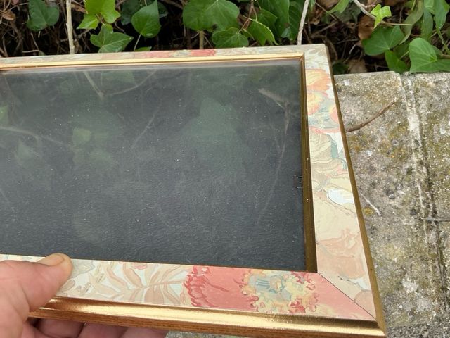 Cornice floreale in legno dorato