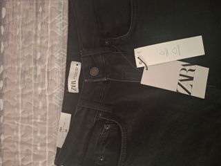 Pantalón flare vaquero negro Zara Talla S/36