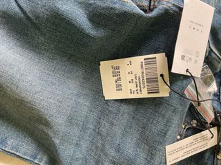 Pantalón Subdued tiro bajo con tachuelas. 