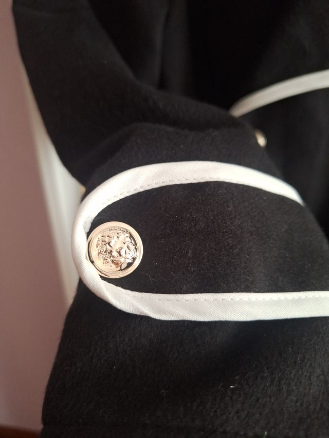 Gabardina niña marinera,está nueva.