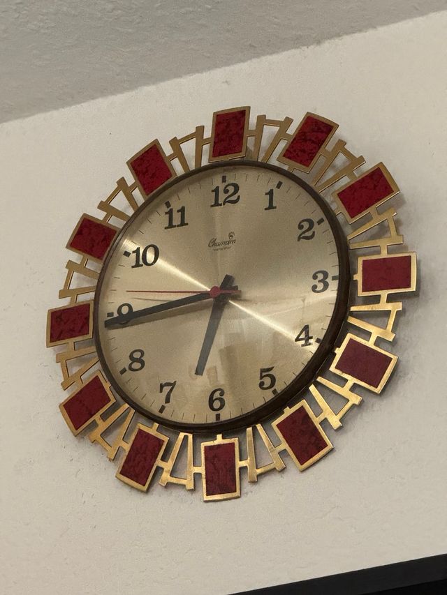Reloj de pared antiguo Champion