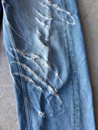 Jeans Alexander Wang Azul con Etiqueta Marrón
