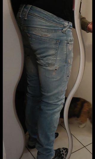 Jeans uomo strappati