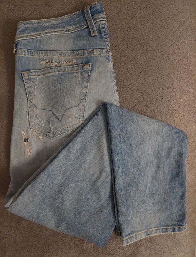 Jeans uomo strappati