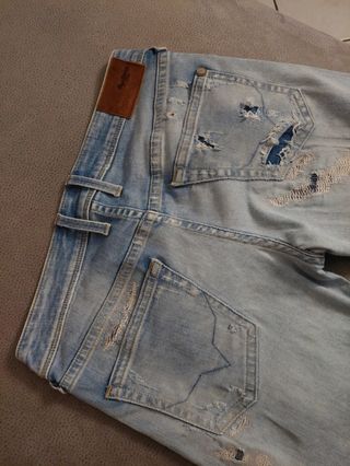 Jeans uomo strappati