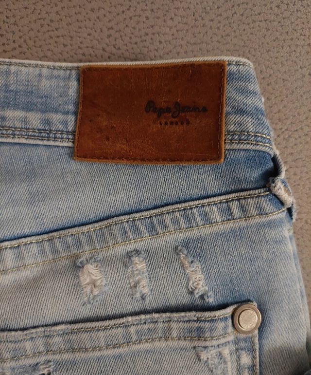 Jeans uomo strappati