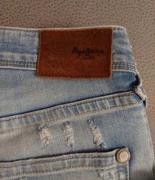 Jeans uomo strappati