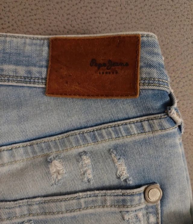 Jeans uomo strappati