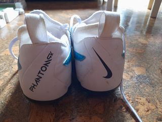 Botas de fútbol Nike Phantom GX (niñ@s)con tacos