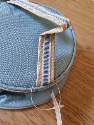 Neceser de viaje azul y beige
