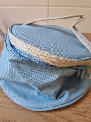 Neceser de viaje azul y beige