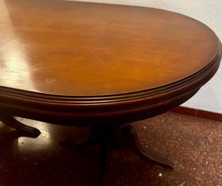 Mesa de comedor ovalada de madera extensible