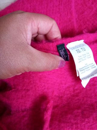 Sciarpa fucsia con frange