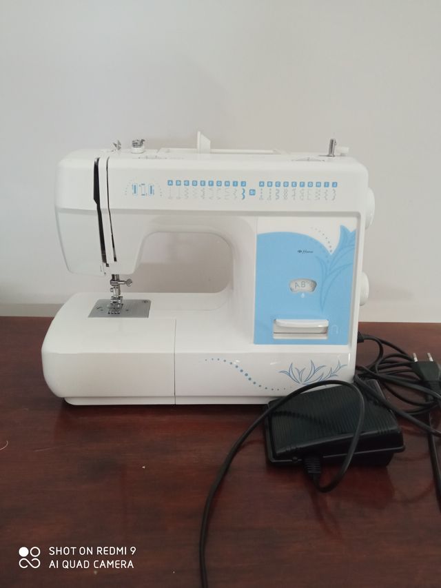 Máquina de coser eléctrica