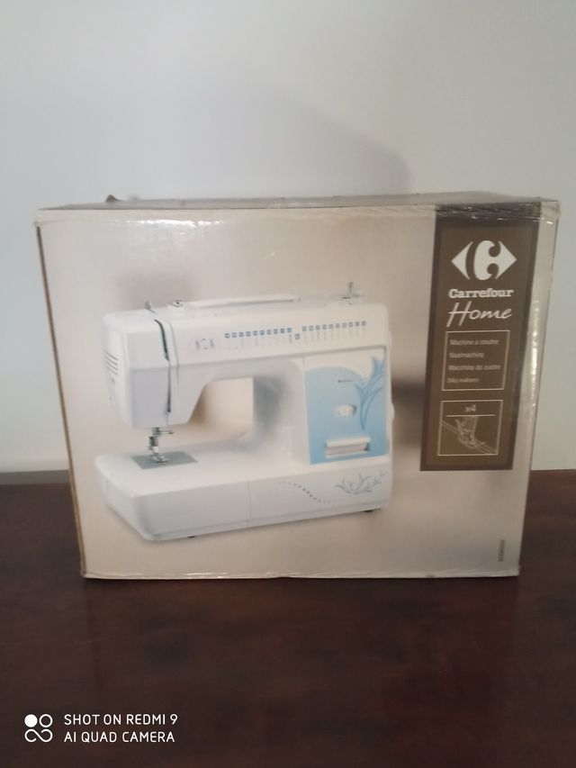 Máquina de coser eléctrica