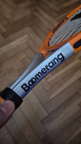 Raqueta Boomerang infantil naranja y regalo 