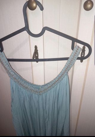 Top turchese con dettagli dorati