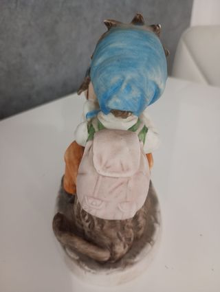 Statuina ceramica bambina su cavallo