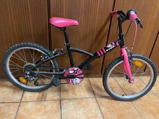 Bicicleta infantil rosa y negra