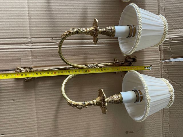 Coppia di lampade da parete in bronzo antico