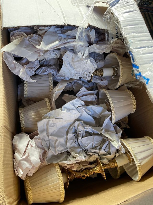 Coppia di lampade da parete in bronzo antico