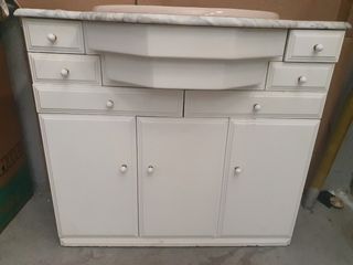 Mueble de baño con lavabo de mármol