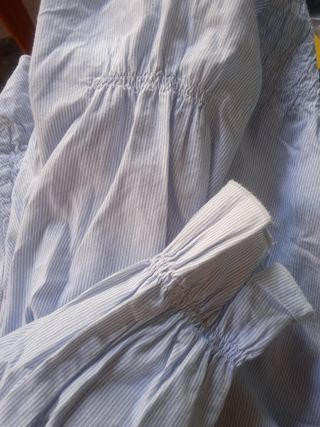 Blusa de niña a rayas celeste. T: 12 años