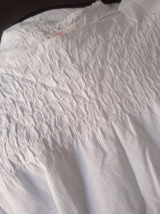 Blusa de niña a rayas celeste. T: 12 años