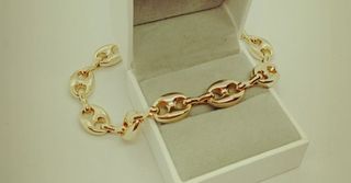 Pulsera laminada en oro 18k
