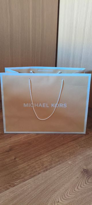 Bolsa Michael Kors dorado
Ancho 38cm
Alto 28cm