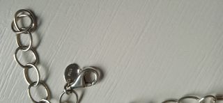 Pulsera de plata con mariposas y flores