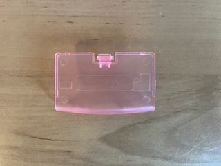 Tapa de pilas GameBoy Advance Rosa Transparente