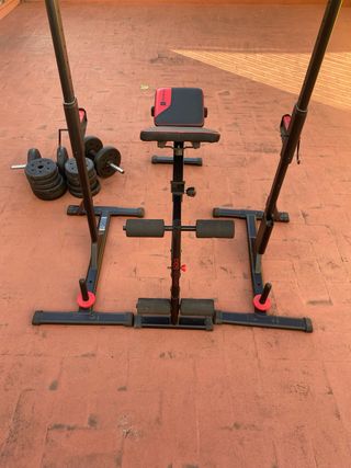 Banco de pesas y discos gimnasio