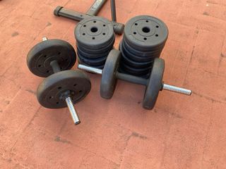 Banco de pesas y discos gimnasio